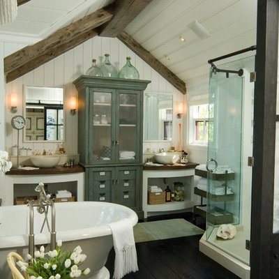 Cottage freestanding bathtub photo in Miami with a vessel sink, open cabinets and white cabinets