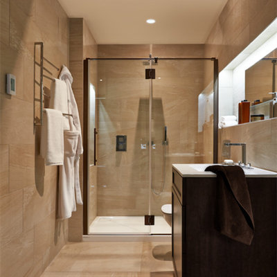 Inspiration for a mid-sized modern master beige tile and ceramic tile ceramic tile bathroom remodel in Chicago with flat-panel cabinets, dark wood cabinets, a one-piece toilet, beige walls and a drop-in sink