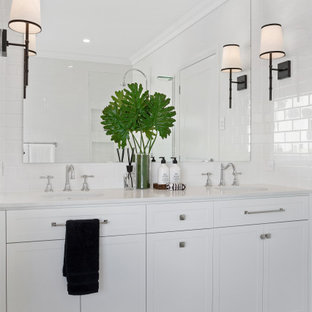 Design ideas for a mid-sized contemporary 3/4 bathroom in Gold Coast - Tweed with shaker cabinets, white cabinets, white tile, an undermount sink, grey floor, grey benchtops, a double vanity and a built-in vanity.