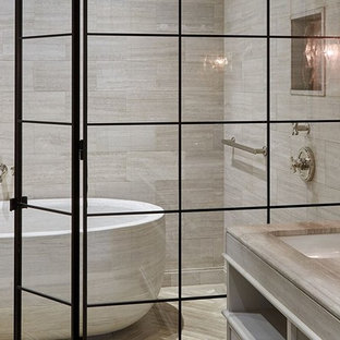 Inspiration for a large asian master wet room bathroom in New York with open cabinets, light wood cabinets, a freestanding tub, beige tile, ceramic tile, beige walls, travertine floors, an undermount sink, engineered quartz benchtops, beige floor and an open shower.