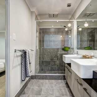 Contemporary shower room bathroom in Perth with flat-panel cabinets, grey cabinets, an alcove shower, grey tiles, grey walls and a sliding door.