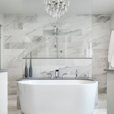 Inspiration for a transitional master gray tile, white tile and marble tile marble floor bathroom remodel in Toronto with flat-panel cabinets and white cabinets