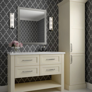 Ispirazione per una piccola stanza da bagno con doccia classica con ante in stile shaker, ante gialle, piastrelle grigie, pareti grigie, pavimento in gres porcellanato, lavabo sottopiano, top in superficie solida, pavimento bianco e top bianco