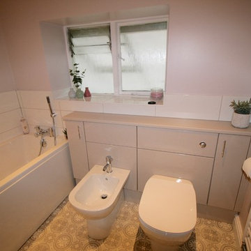 The petite pink and grey bathroom
