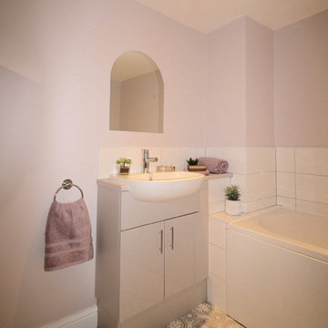 The petite pink and grey bathroom