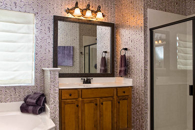 Mid-sized elegant master blue tile bathroom photo in Nashville with furniture-like cabinets, black cabinets and glass countertops