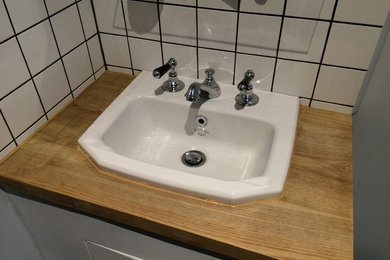 Inspiration for a contemporary bathroom in West Midlands with an integrated sink.
