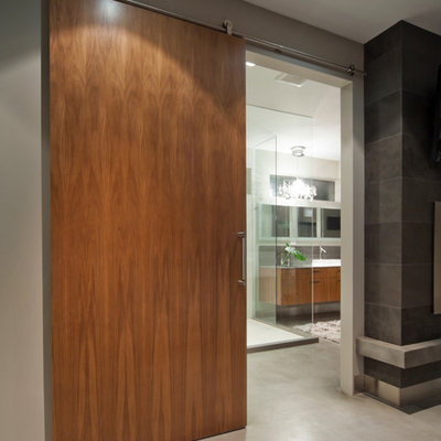 Corner shower - contemporary corner shower idea in Vancouver with a vessel sink, flat-panel cabinets and medium tone wood cabinets