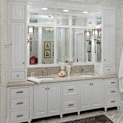 Bathroom - traditional bathroom idea in Minneapolis with an undermount sink, raised-panel cabinets, white cabinets, granite countertops and beige countertops