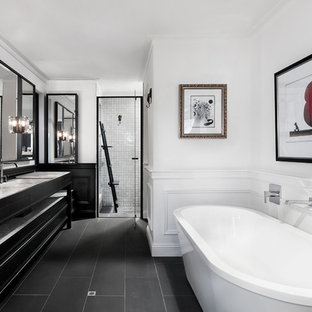 Contemporary master wet room bathroom in Perth with open cabinets, a freestanding tub, gray tile, white walls, black floor and beige benchtops.