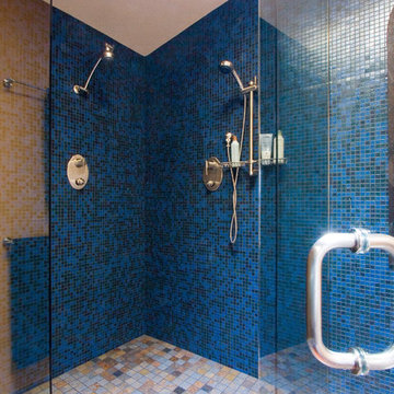 This 2-shower-head, spacious shower anchors the master bathroom of this whole-ho
