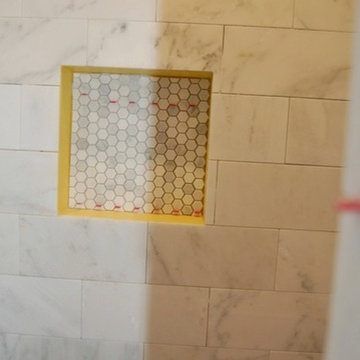 This is Picture 1 of 4 showing the installation of a Carrara Venato Bathroom