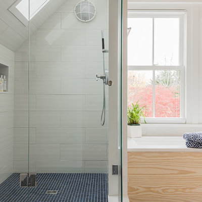 Corner shower - mid-sized coastal white tile and ceramic tile mosaic tile floor and blue floor corner shower idea in Boston with white walls, an undermount tub, an undermount sink and quartz countertops