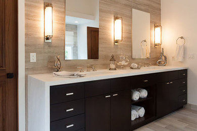 Inspiration for a huge contemporary master gray tile and mosaic tile light wood floor and brown floor bathroom remodel in Los Angeles with flat-panel cabinets, dark wood cabinets, multicolored walls, a trough sink, quartz countertops and a hinged shower door