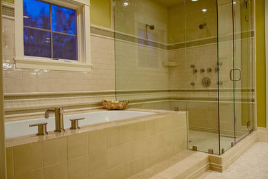 Mid-sized elegant master beige tile and porcelain tile mosaic tile floor and beige floor alcove shower photo in Salt Lake City with an undermount tub, green walls and a hinged shower door