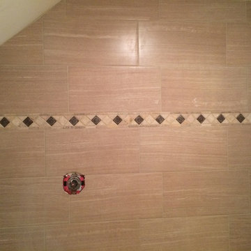 Tile shower. Untraditional brick pattern.