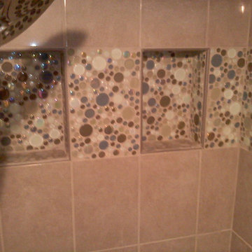 tile shower with bubble accent tiles