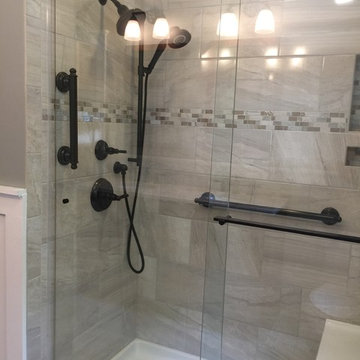 Tile shower with Kohler Bancroft fixtures