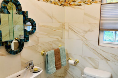 Photo of a traditional shower room bathroom in Grand Rapids with a wall-mounted sink, ceramic tiles and ceramic flooring.