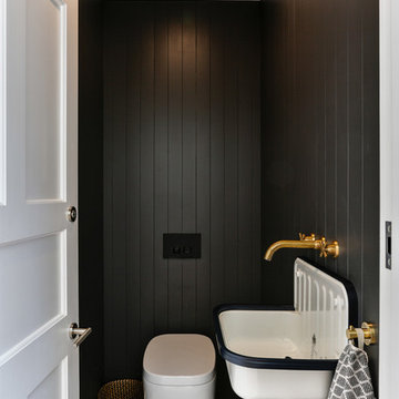 Tongue and groove black panelled bathroom