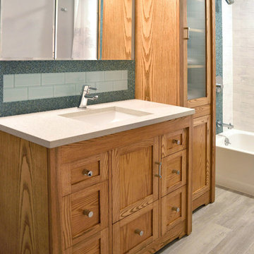 Total bathroom remodel with custom cabinetry