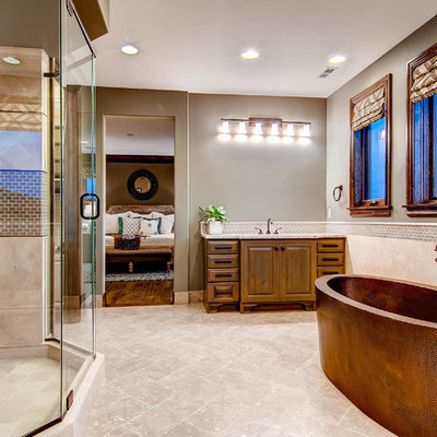 Inspiration for a large timeless master limestone floor bathroom remodel in Denver with granite countertops, raised-panel cabinets and medium tone wood cabinets