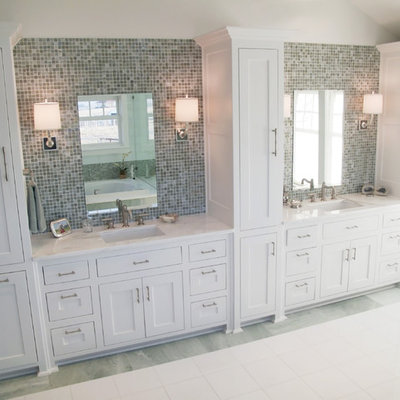 Bathroom - traditional mosaic tile bathroom idea in Dallas with shaker cabinets