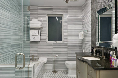 Mid-sized minimalist master gray tile, white tile and porcelain tile marble floor bathroom photo in New York with flat-panel cabinets, beige cabinets, a one-piece toilet, gray walls, an undermount sink and quartzite countertops