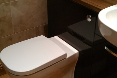 Design ideas for a medium sized contemporary cloakroom in Other.