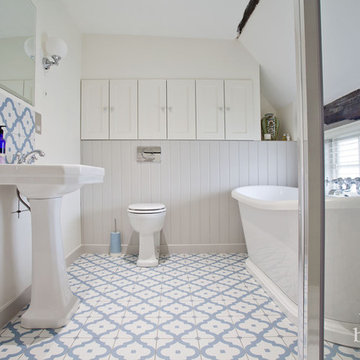 Traditional family bathroom and ensuite in Grade II listed cottage, Lindfield