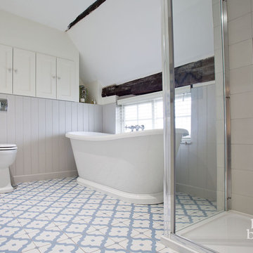 Traditional family bathroom and ensuite in Grade II listed cottage, Lindfield