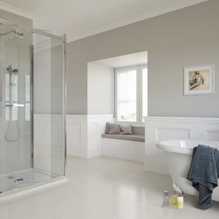Inspiration for a large traditional master bathroom in Other with a claw-foot tub, a corner shower, grey walls, porcelain floors, white tile and ceramic tile.