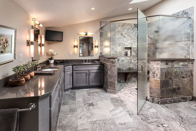 Walk-in shower - large transitional master marble floor and gray floor walk-in shower idea in Chicago with recessed-panel cabinets, gray cabinets, beige walls, an undermount sink, a hinged shower door and gray countertops