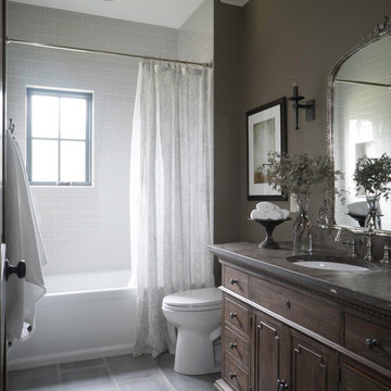 Traditional white, grey, and wood bathroom
