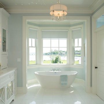 Tranquil spa bathroom with water views