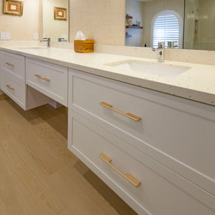Inspiration for a large contemporary master beige tile and porcelain tile wood-look tile floor, beige floor, double-sink and wallpaper bathroom remodel in Other with shaker cabinets, white cabinets, a bidet, an undermount sink, quartz countertops, a hinged shower door, beige countertops and a floating vanity