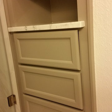 transformed standard linen closet to functional and versitle sold wood with draw