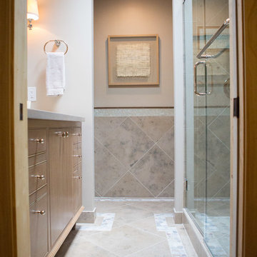 Transitional Bath with River Rock Accents