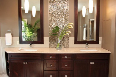 Bathroom - large transitional master beige tile and mosaic tile ceramic tile bathroom idea in New York with an undermount sink, recessed-panel cabinets, dark wood cabinets, granite countertops and brown walls
