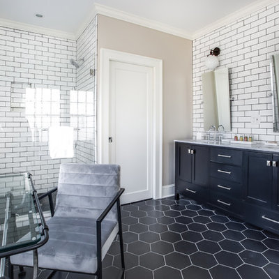 Bathroom - transitional white tile and subway tile black floor bathroom idea in Atlanta with furniture-like cabinets, black cabinets, beige walls, an undermount sink and gray countertops
