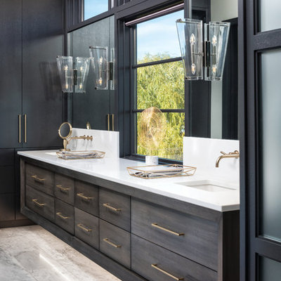 Bathroom - contemporary white floor bathroom idea in Other with flat-panel cabinets, gray cabinets, white walls, an undermount sink and white countertops