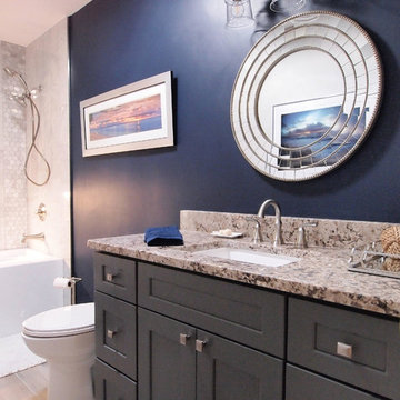 Transitional Designed Navy Guest Bathroom