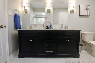 Mid-sized master white tile and porcelain tile porcelain tile and white floor bathroom photo in Toronto with furniture-like cabinets, dark wood cabinets, a two-piece toilet, gray walls, a drop-in sink, marble countertops and gray countertops