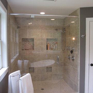 Transitional Freestanding Master Bath remodel with a two person alcove symmetric