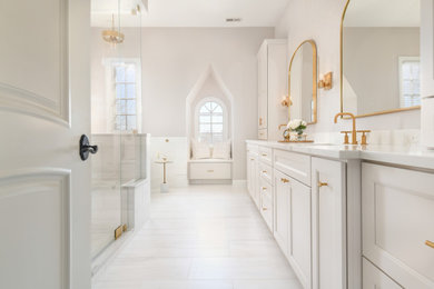 Bathroom - large transitional master ceramic tile and white tile ceramic tile, double-sink and white floor bathroom idea in Chicago with beige walls, an undermount sink, quartzite countertops, a hinged shower door, white countertops, a built-in vanity, recessed-panel cabinets and white cabinets