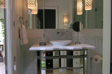 Inspiration for a contemporary bathroom remodel in San Diego with a vessel sink