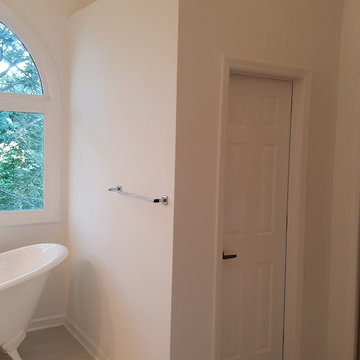Transitional White Bathroom with Sliding Barn Doors