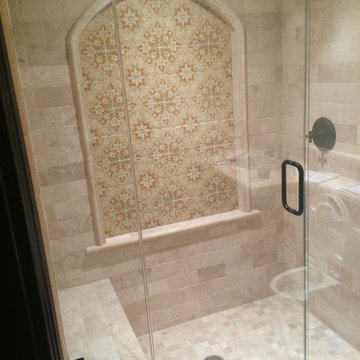 Travertine and Handpainted Terra Cotta Tile Shower