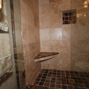 Travertine and Marble Shower with French Gold Kohler Fixtures