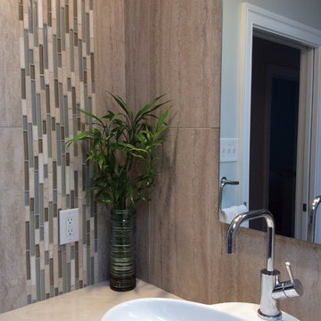 Travertine-look Porcelain with Glass and Stone Mosaic Waterfall Look